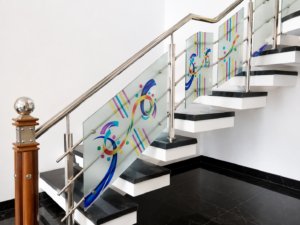 Stainless steel balcony railing design with glass